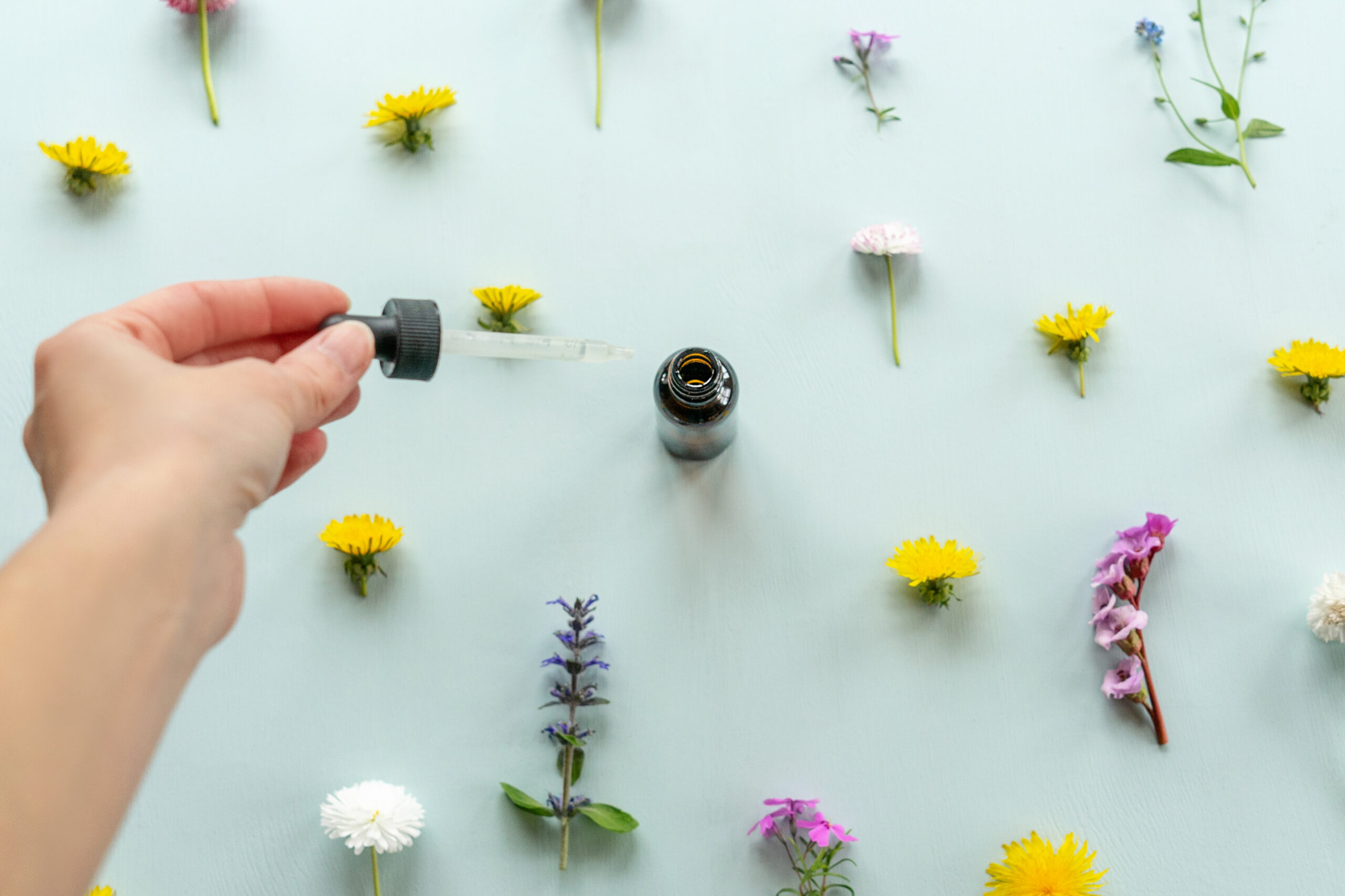Bottles with flower essential oil